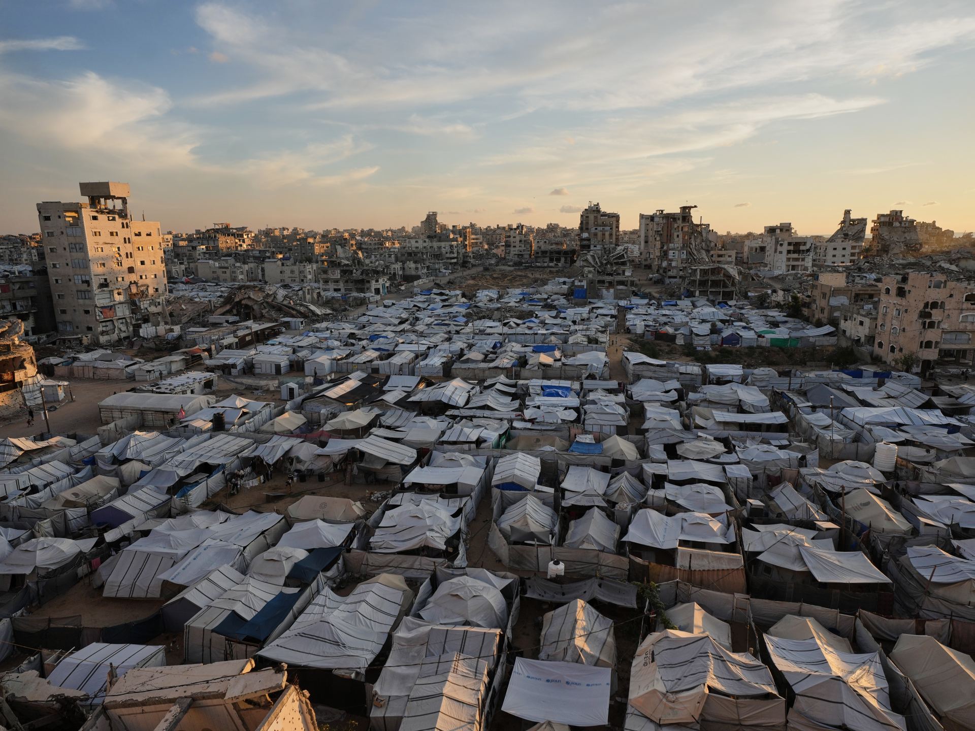 Photos: Three years of Israel’s war on Gaza as tent cities spread amid ruin