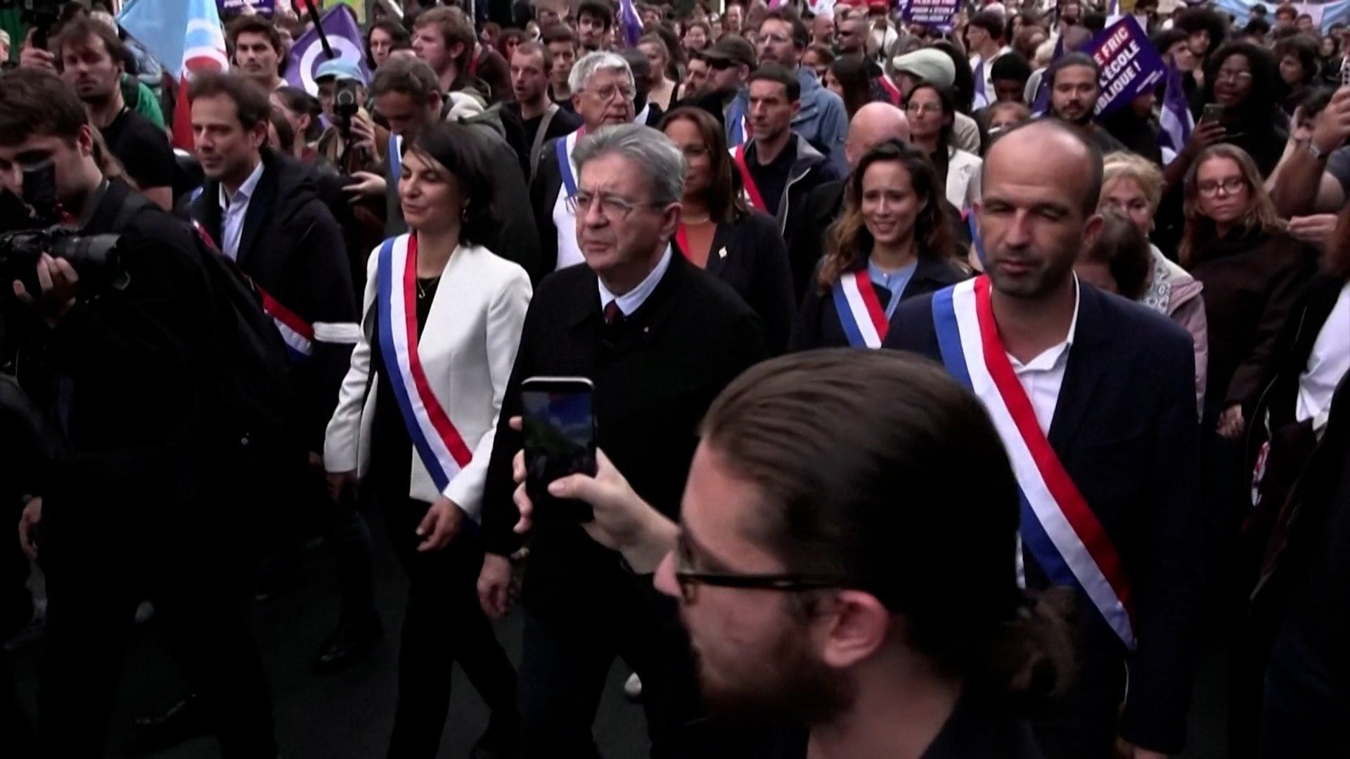 Presidential hopeful Melenchon joins France school protest march