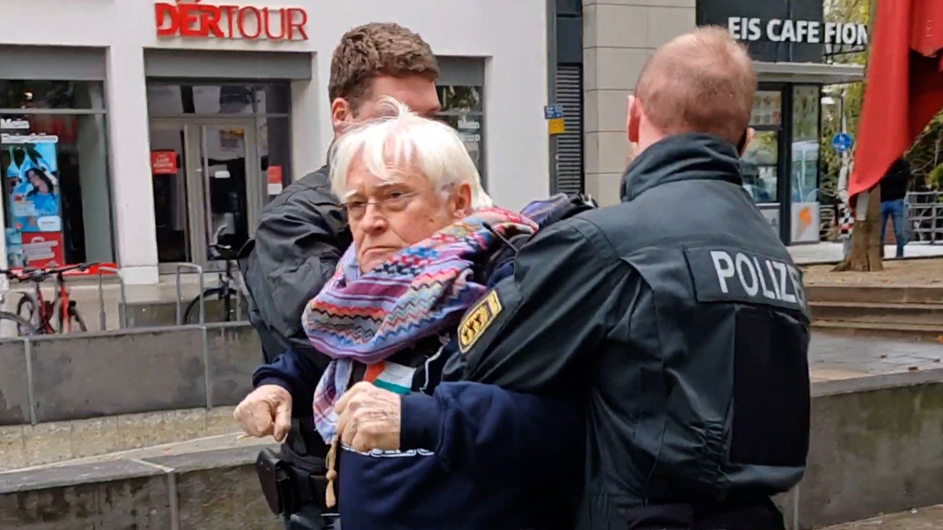 Elderly man forcibly detained at Elbit Systems protest in Germany