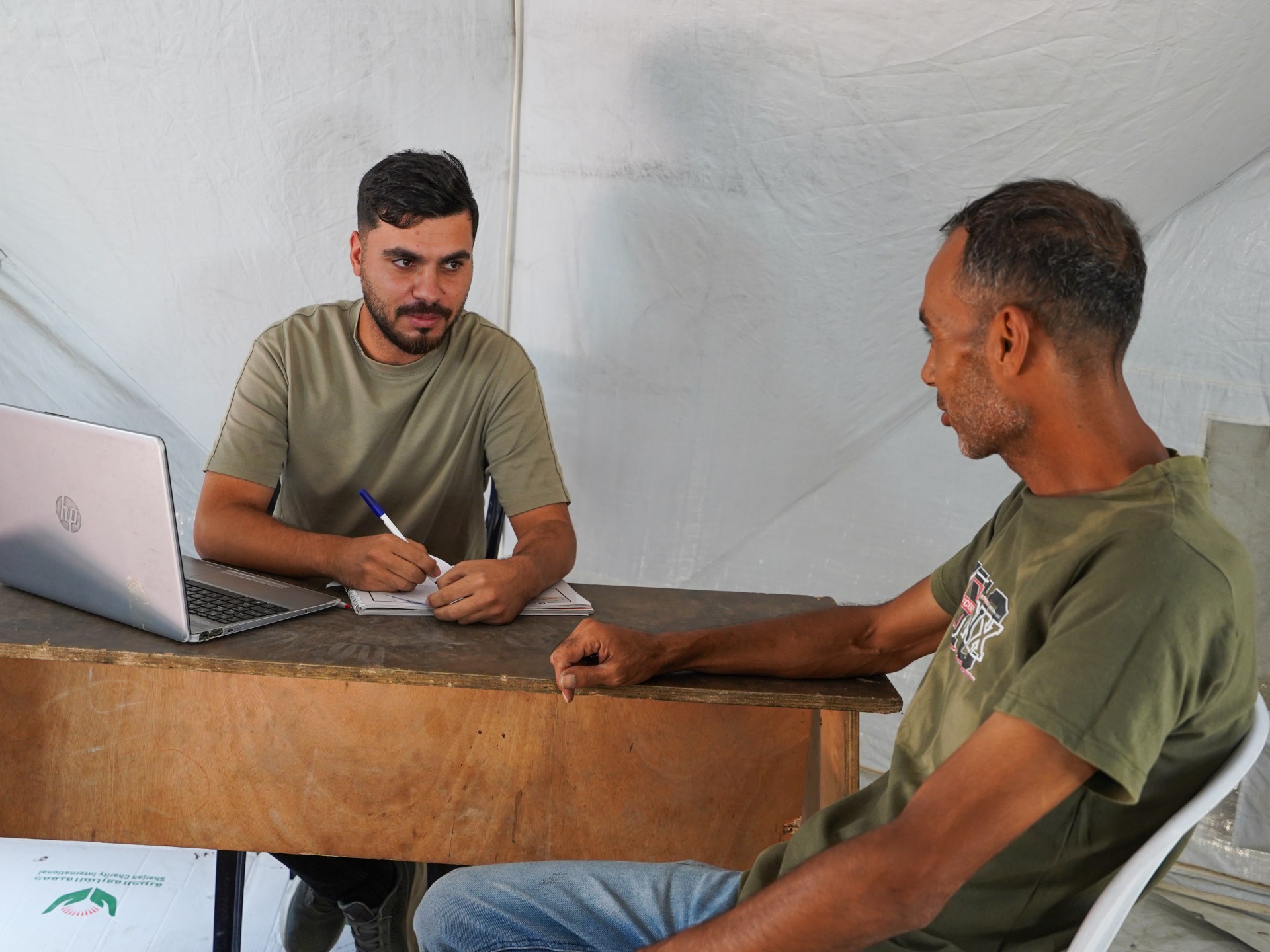 When streets become a workplace: Gaza workers convert tents into offices