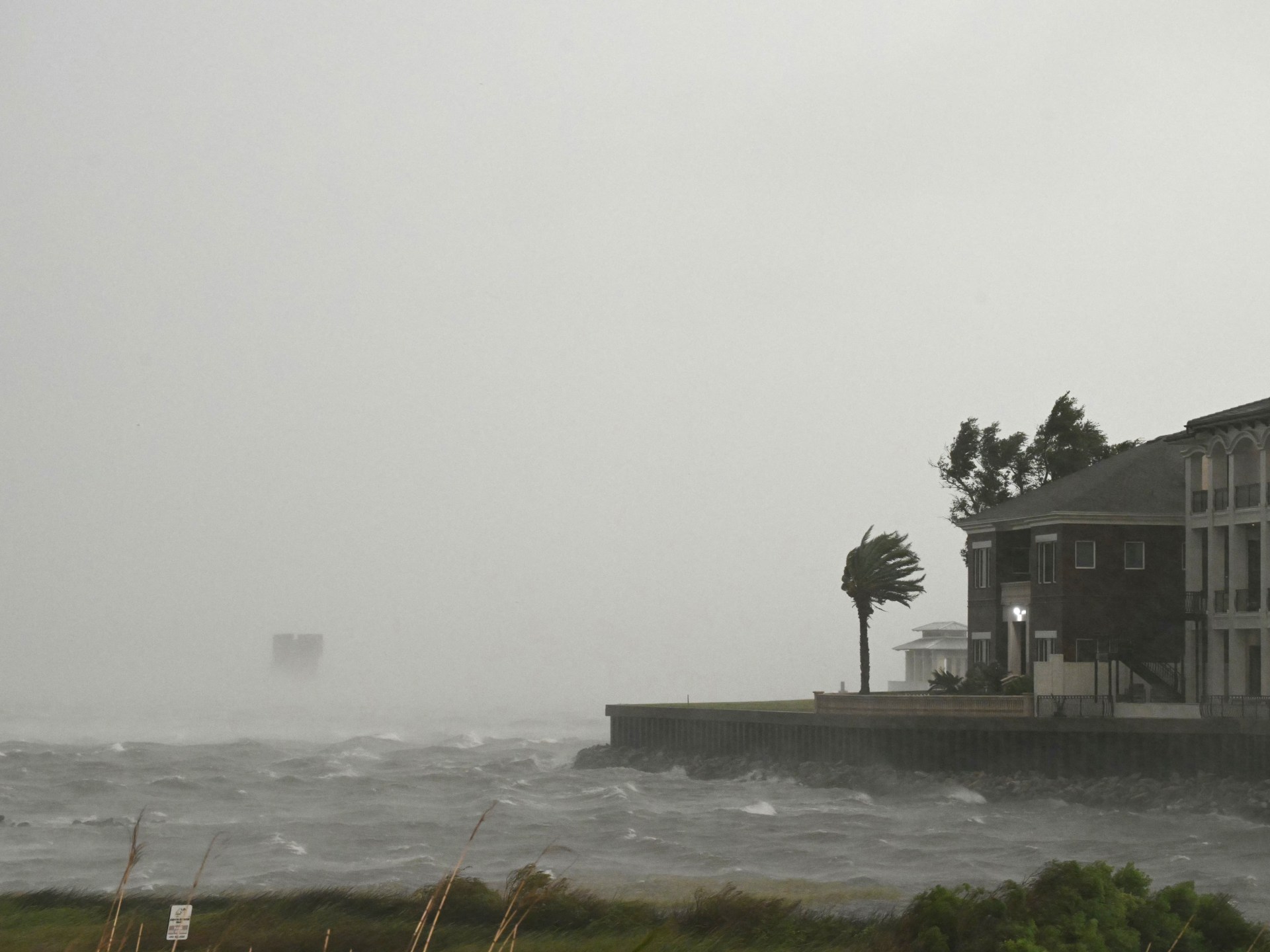 Isaias weakens after making landfall in US Gulf Coast as hurricane