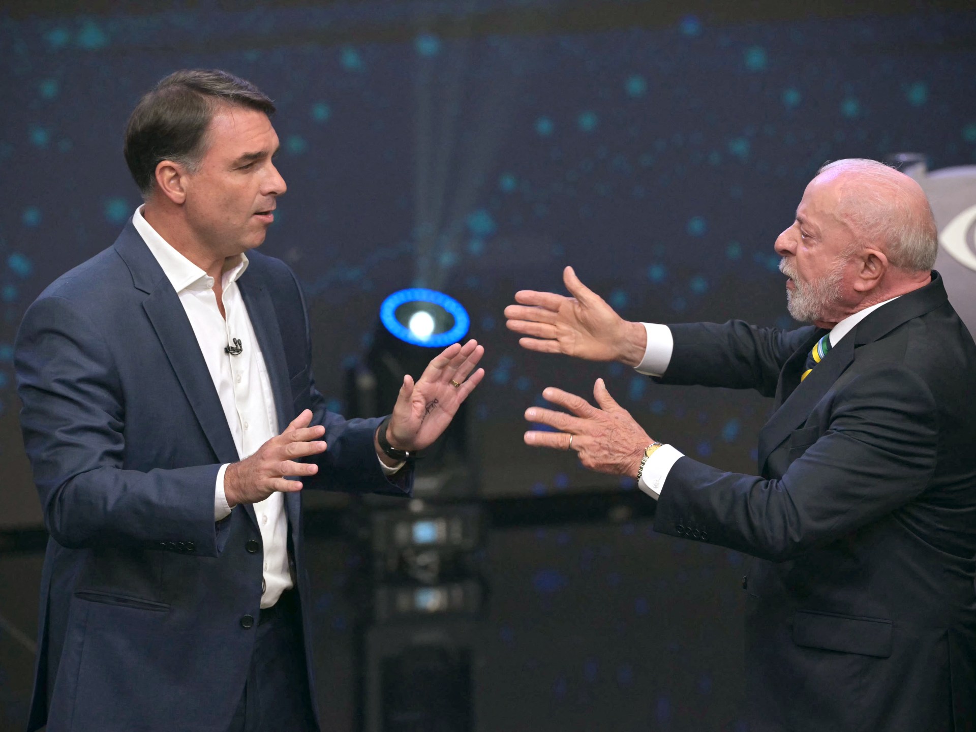 Lula and Bolsonaro spar in Brazil’s fiery first presidential run-off debate