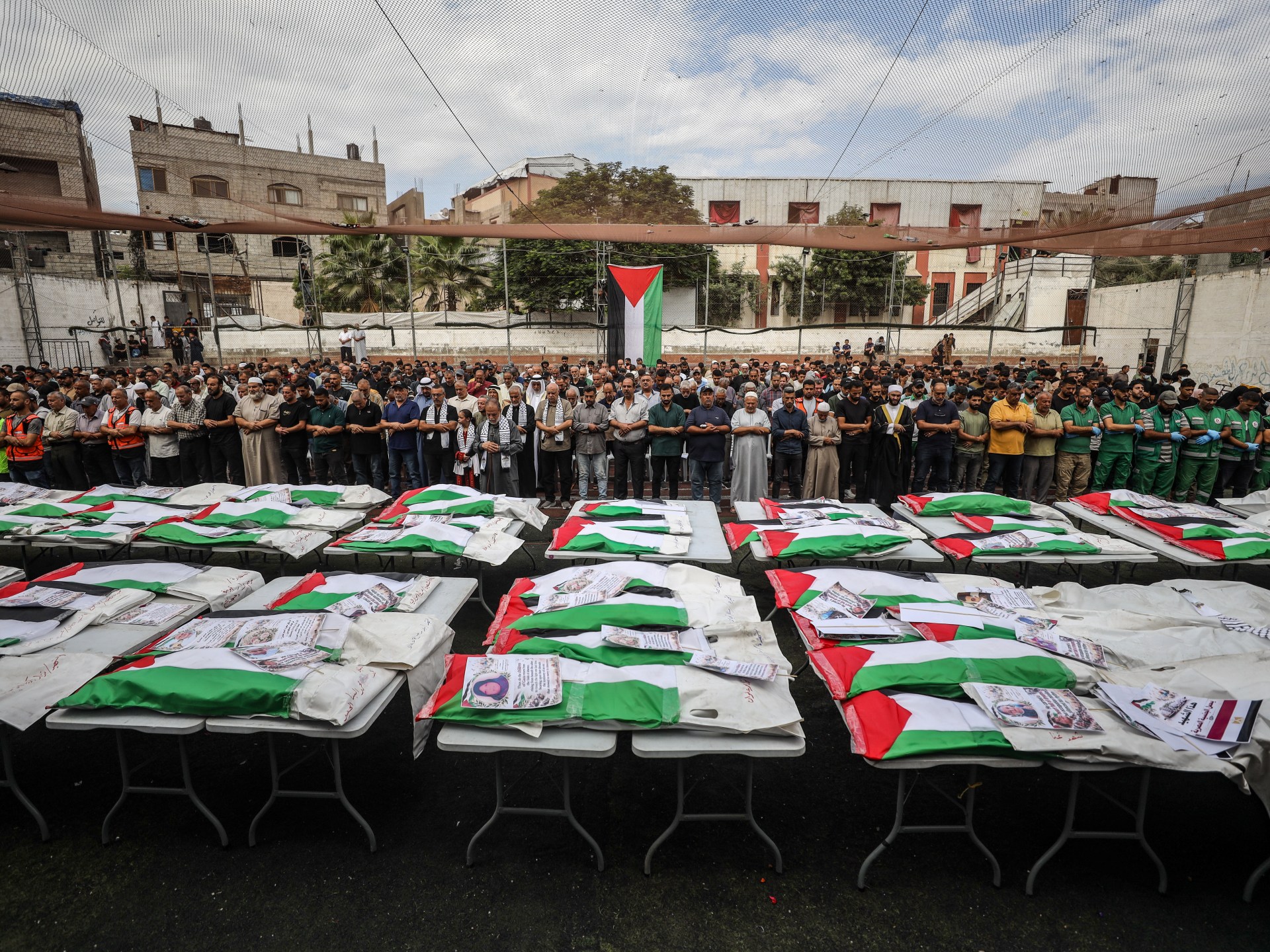 Funeral held for 75 Palestinians after remains recovered from Gaza ruins