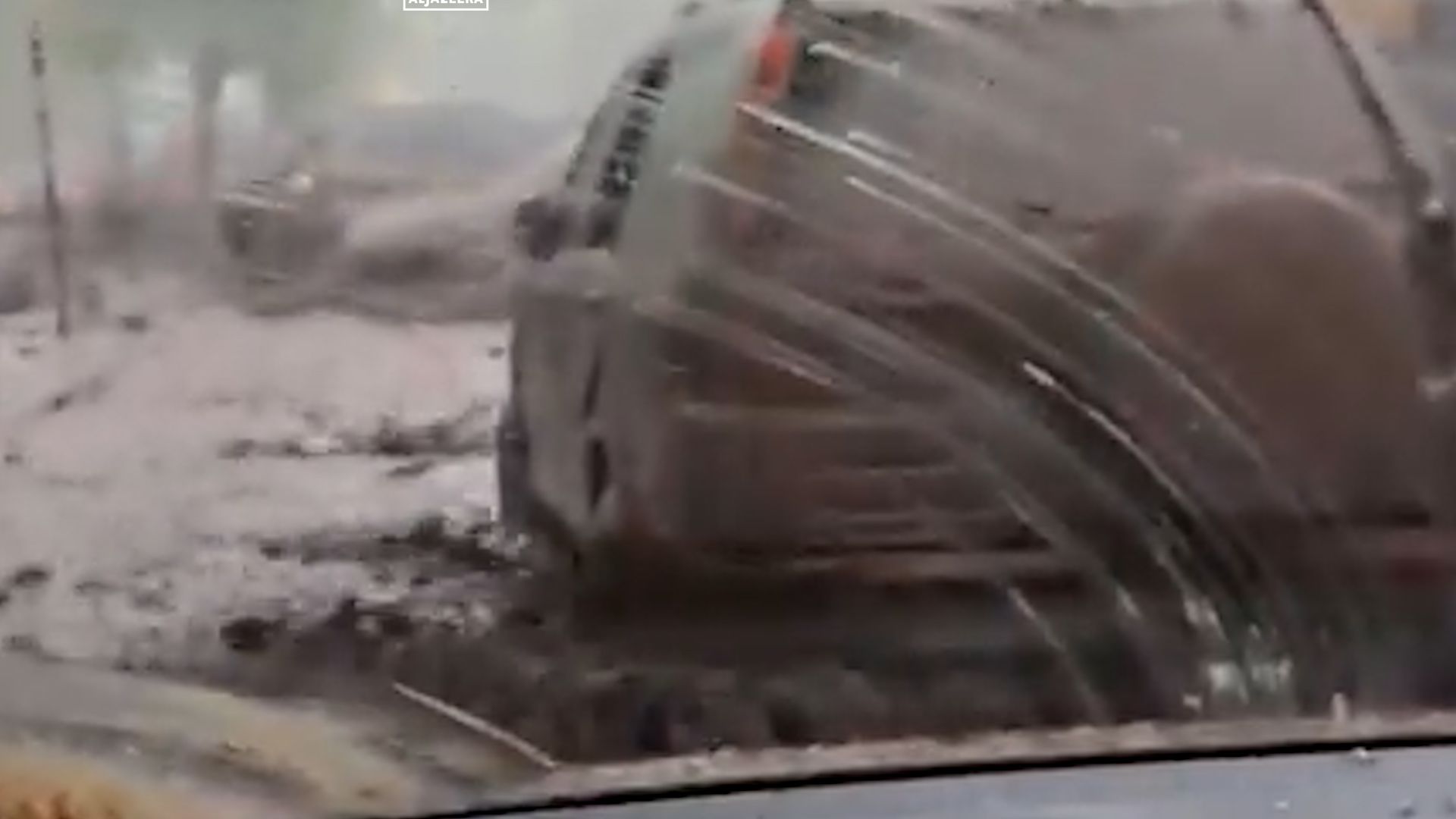 Driver films from inside vehicle as car swept away in Chile floods