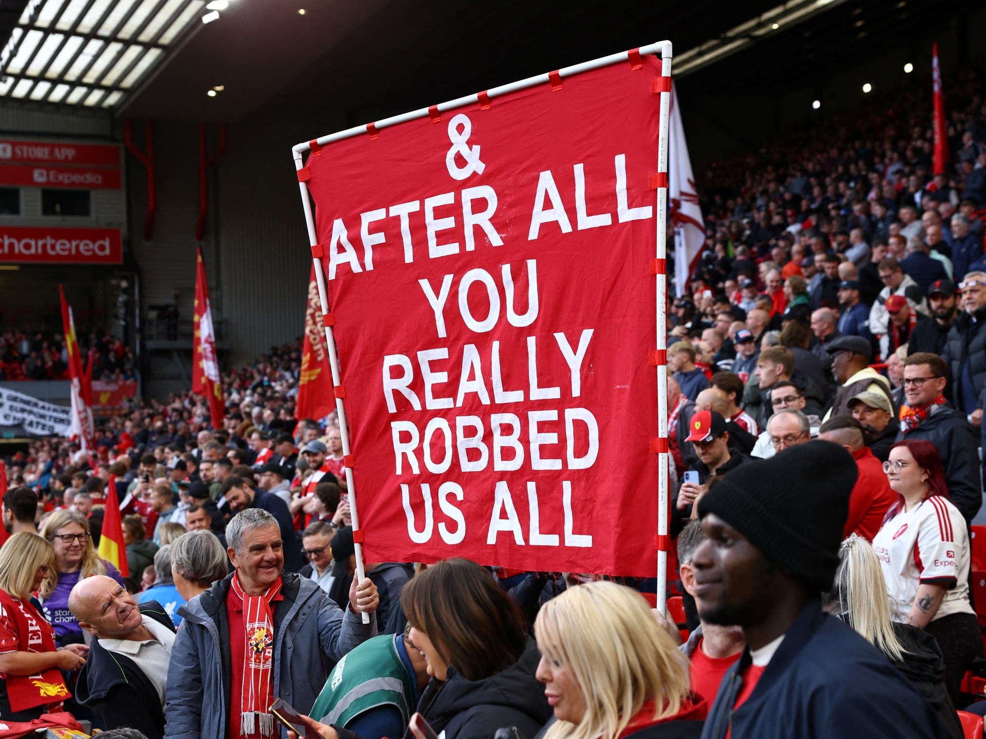 Which banners did Liverpool fans display at Anfield against Man City?
