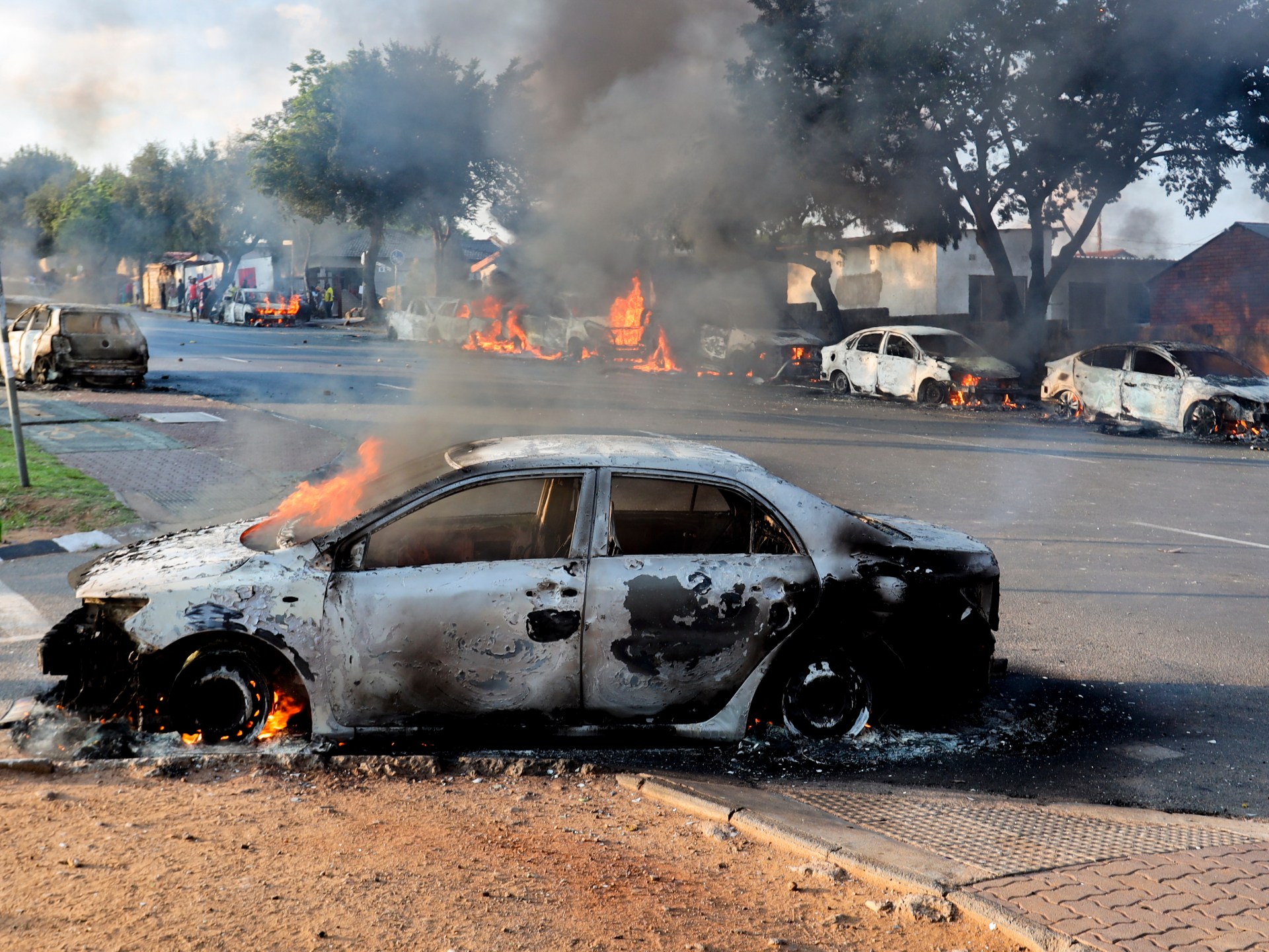 South Africa protests turn violent amid rage over asylum ruling