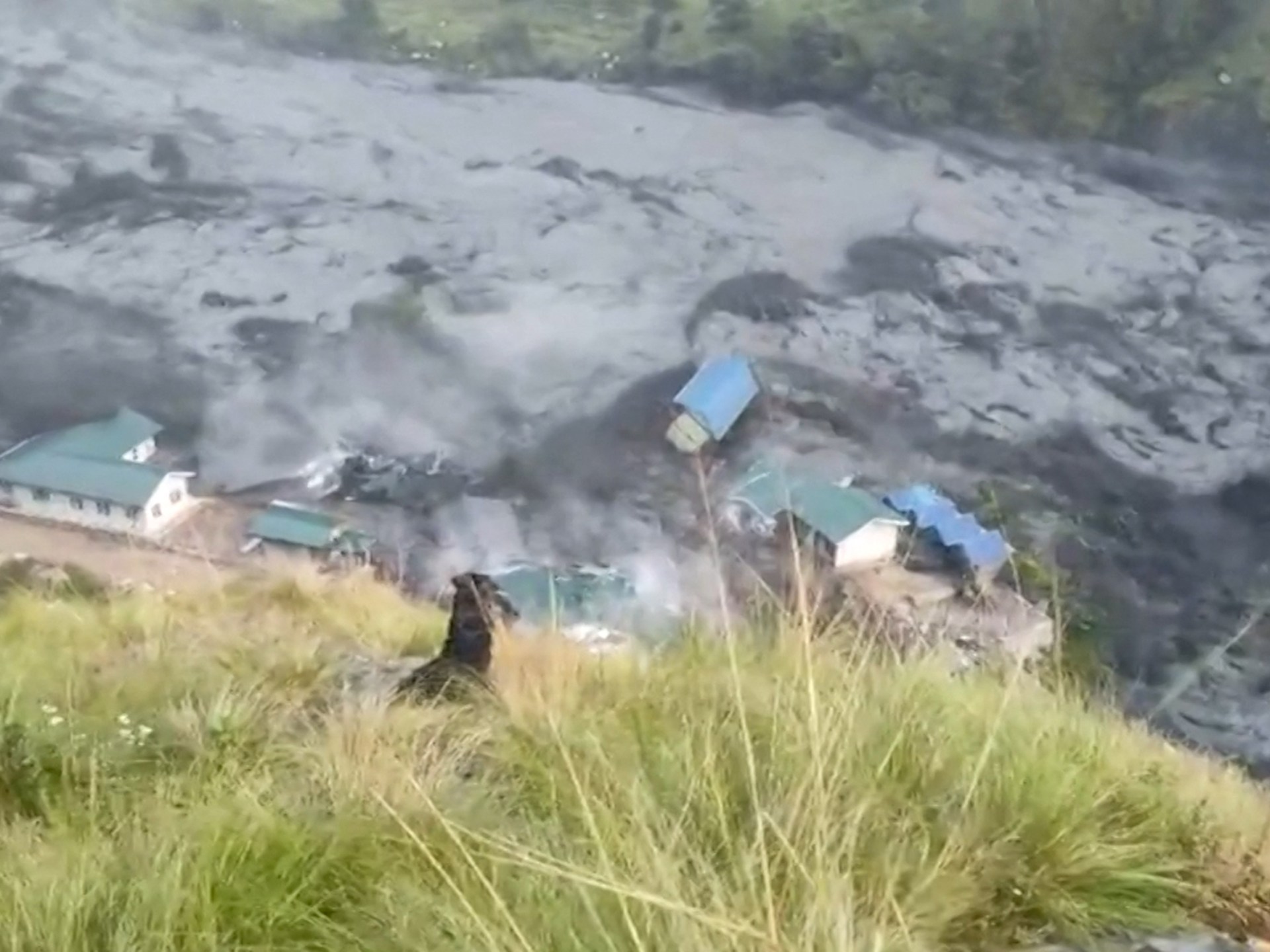 At least five people missing as flash floods in Nepal sweep away houses